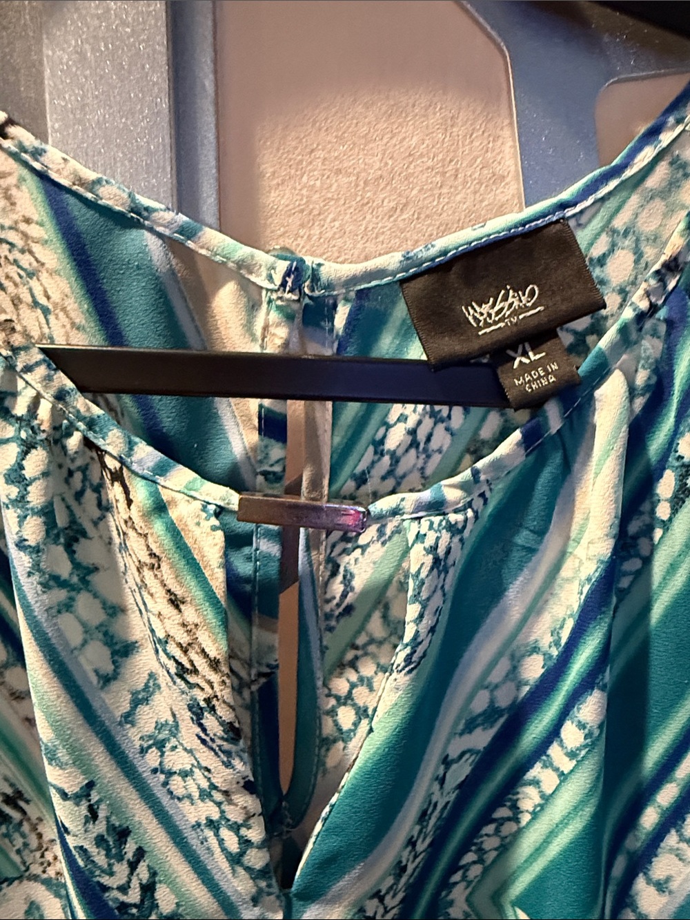 Vivid Teal & Blue Geometric Sleeveless Blouse